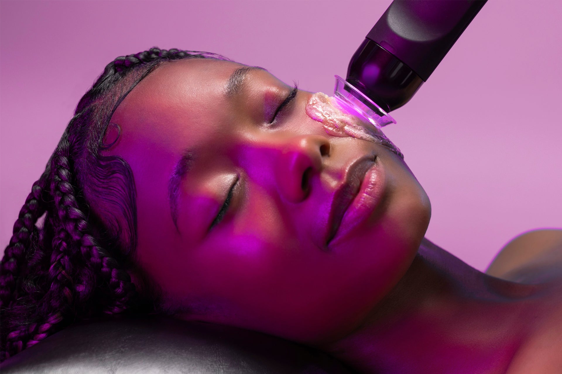 Glo2 facial treatment being performed on the face using advanced oxygenation technology to exfoliate, infuse serums, and enhance skin radiance and hydration.