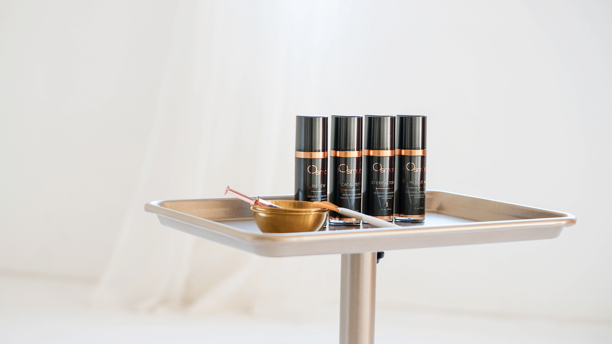 Osmosis Skincare products displayed on a treatment tray for the Glass Skin Facial at Golden Pearl Aesthetics & Wellness in St. Augustine, FL