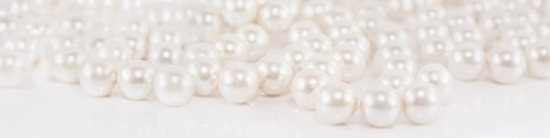 Pearl detail representing timeless elegance and refined aesthetic branding
