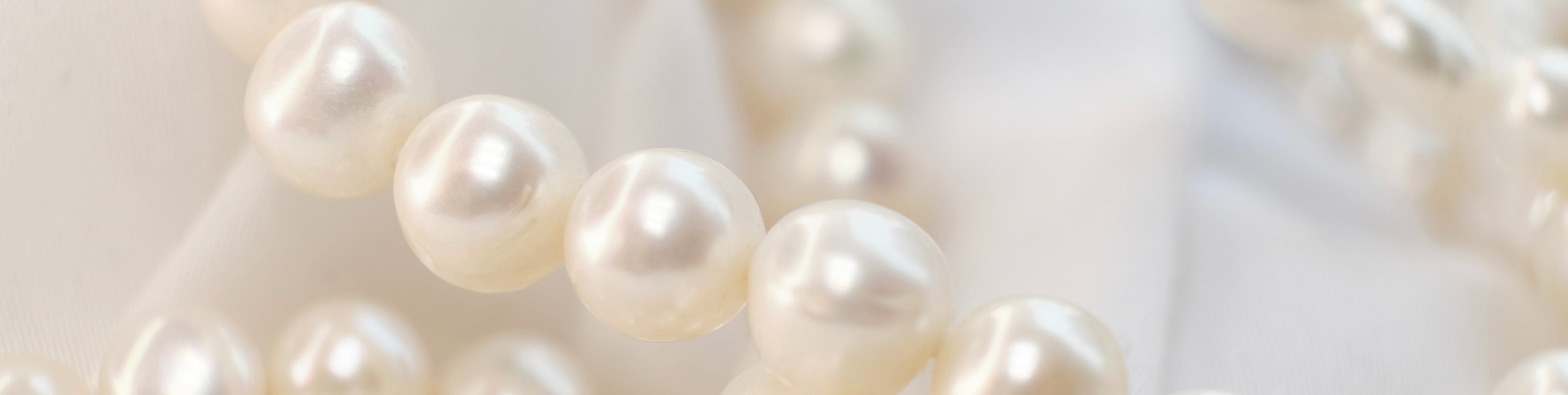 Pearl detail representing timeless elegance and refined aesthetic branding




